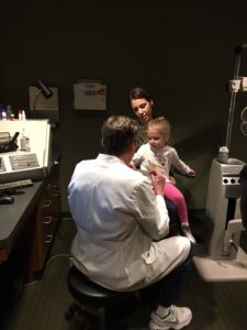 pediatric patient getting an eye exam