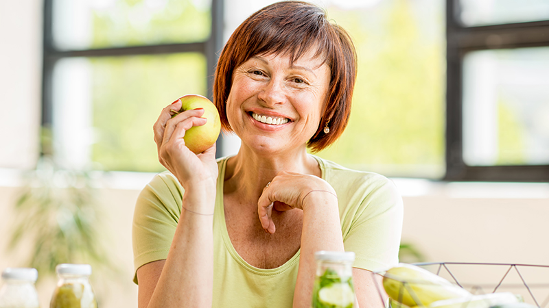 lady with apple, healthy habbits