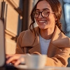 Young Woman on Laptop Outside