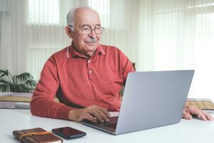 man using computer for telemedicine